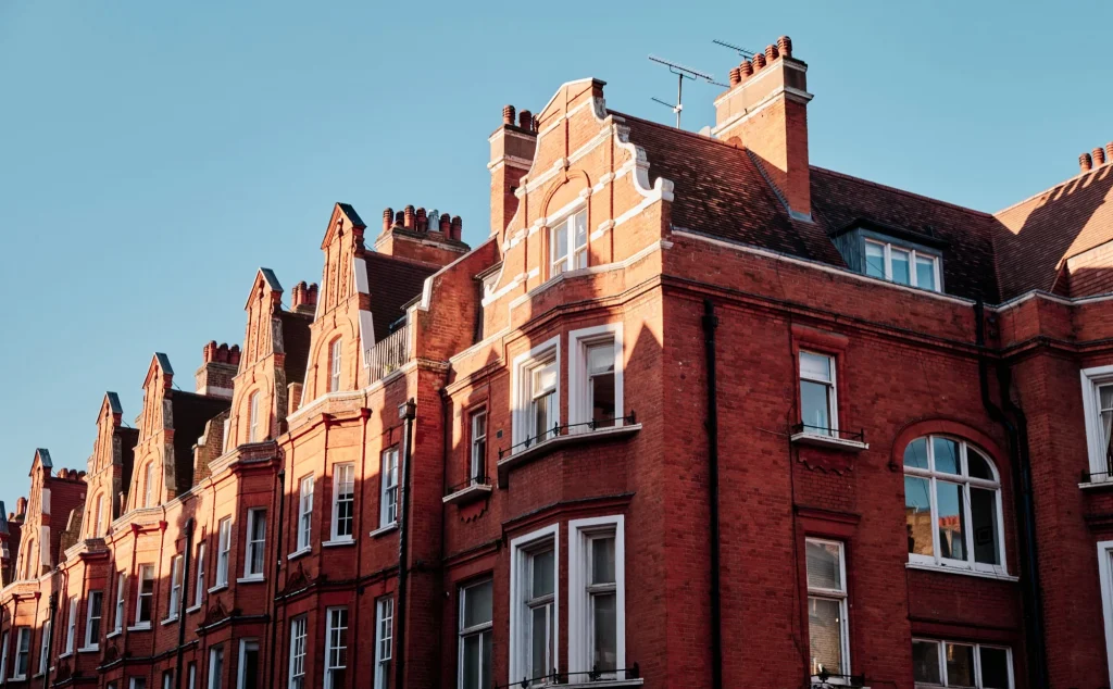 Red brick houses with blue sky.